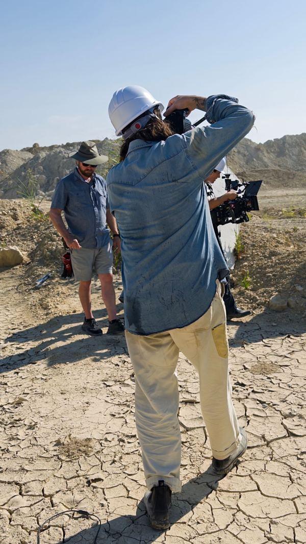 Photographer at work on a rocky location
