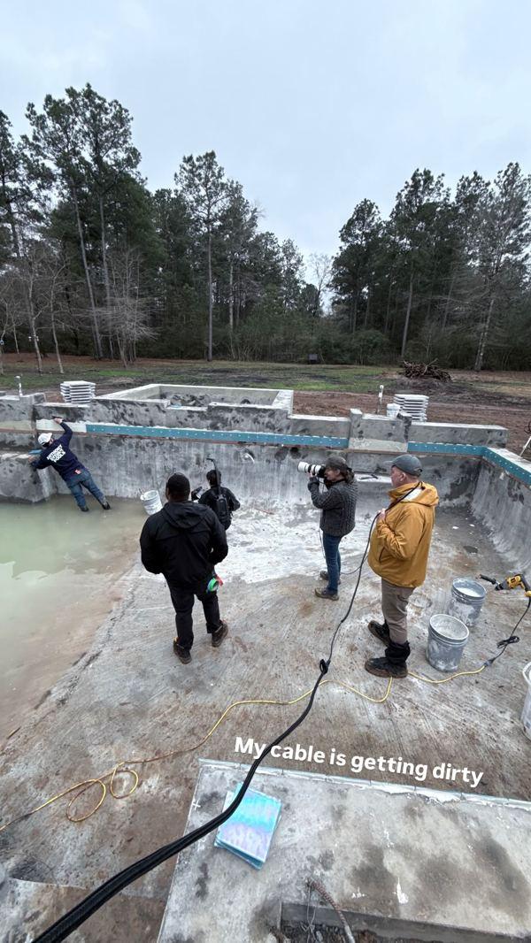 Pool build on location, tether cable in the dirt
